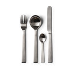 A clear cut image of Acme's cutlery. Image contains a fork, spoon, teaspoon and knife on a plain white background.